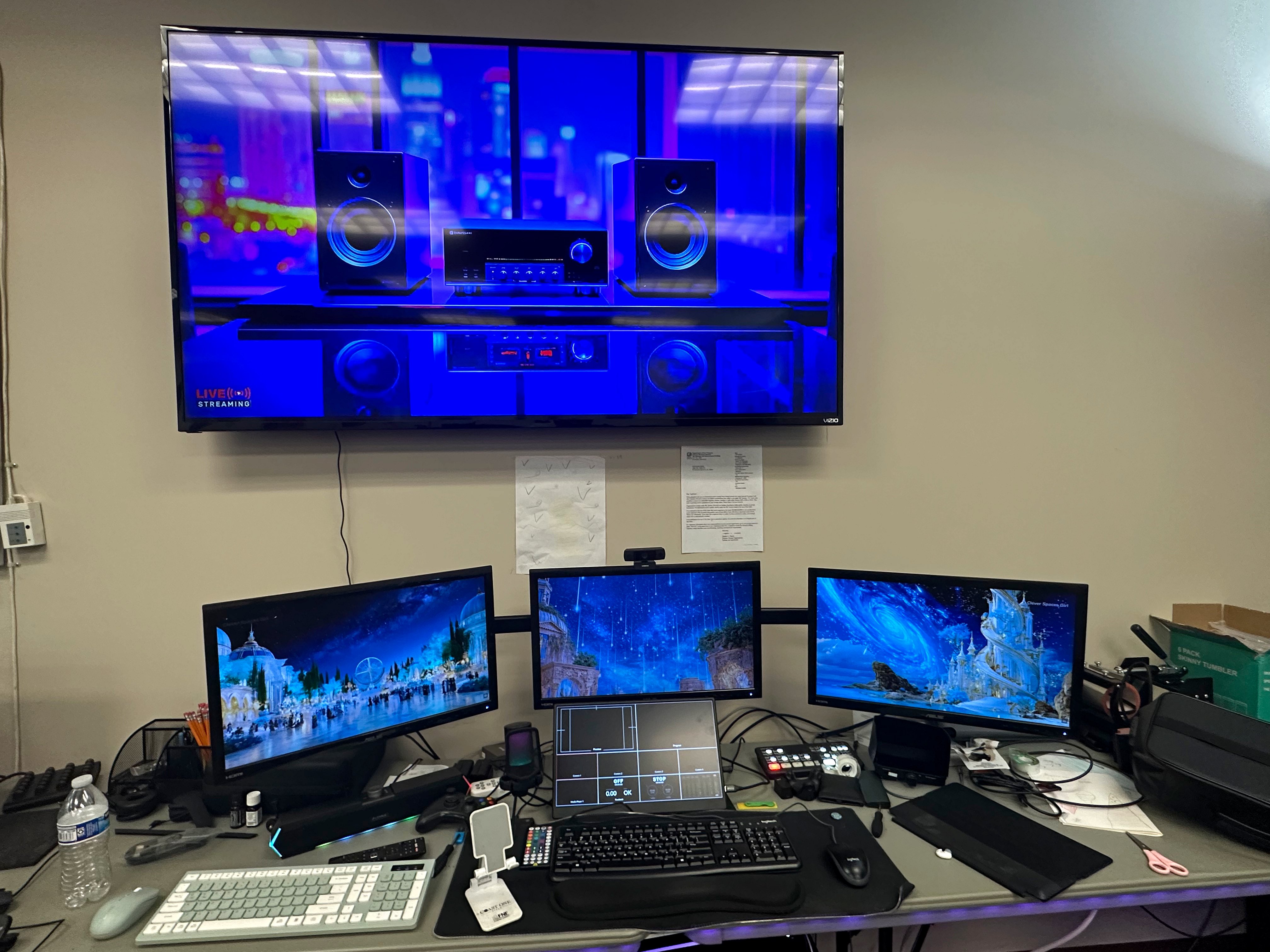 Audio streaming setup with professional display monitors