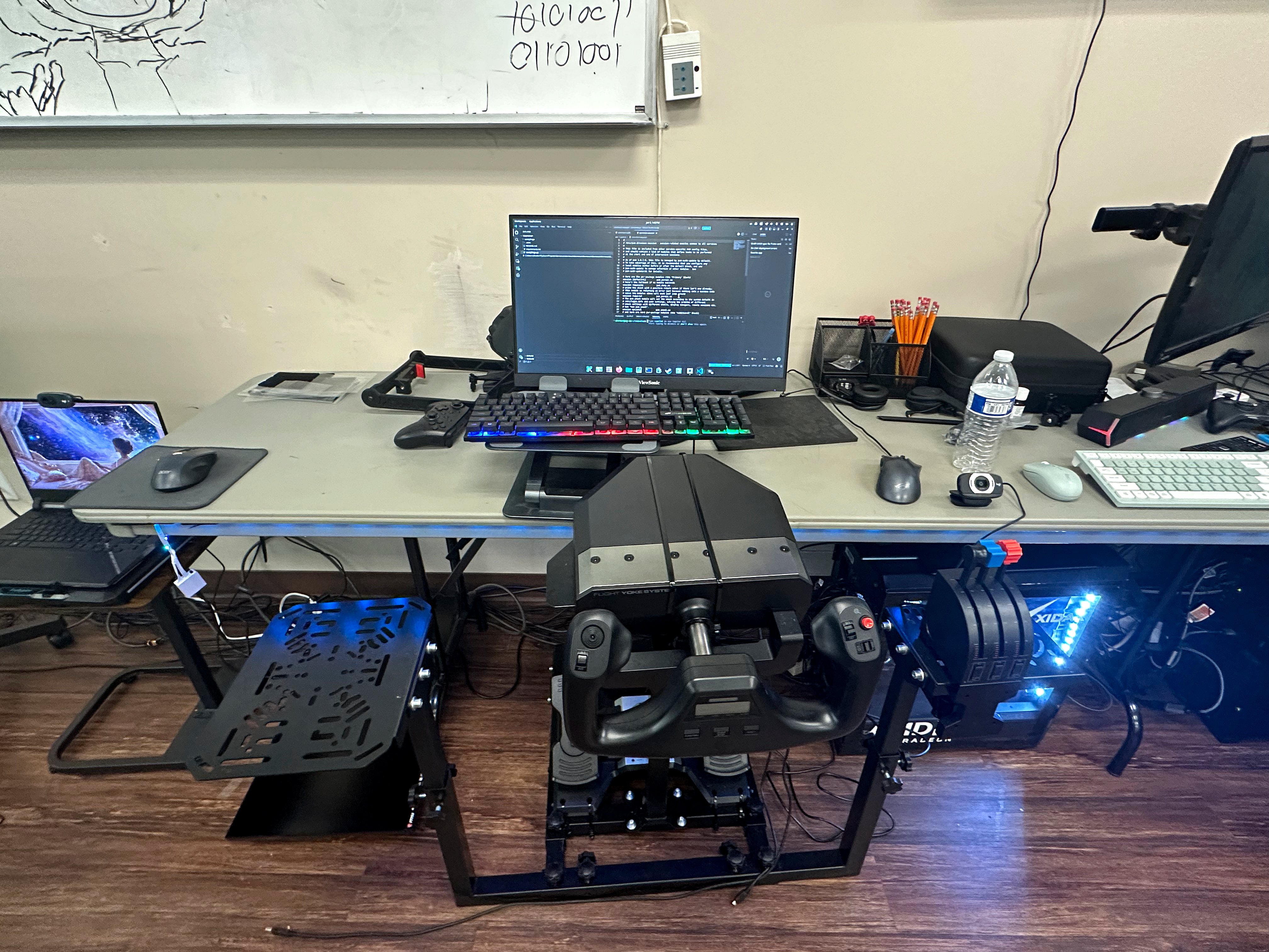 Multi-monitor developer workstation with coding setup