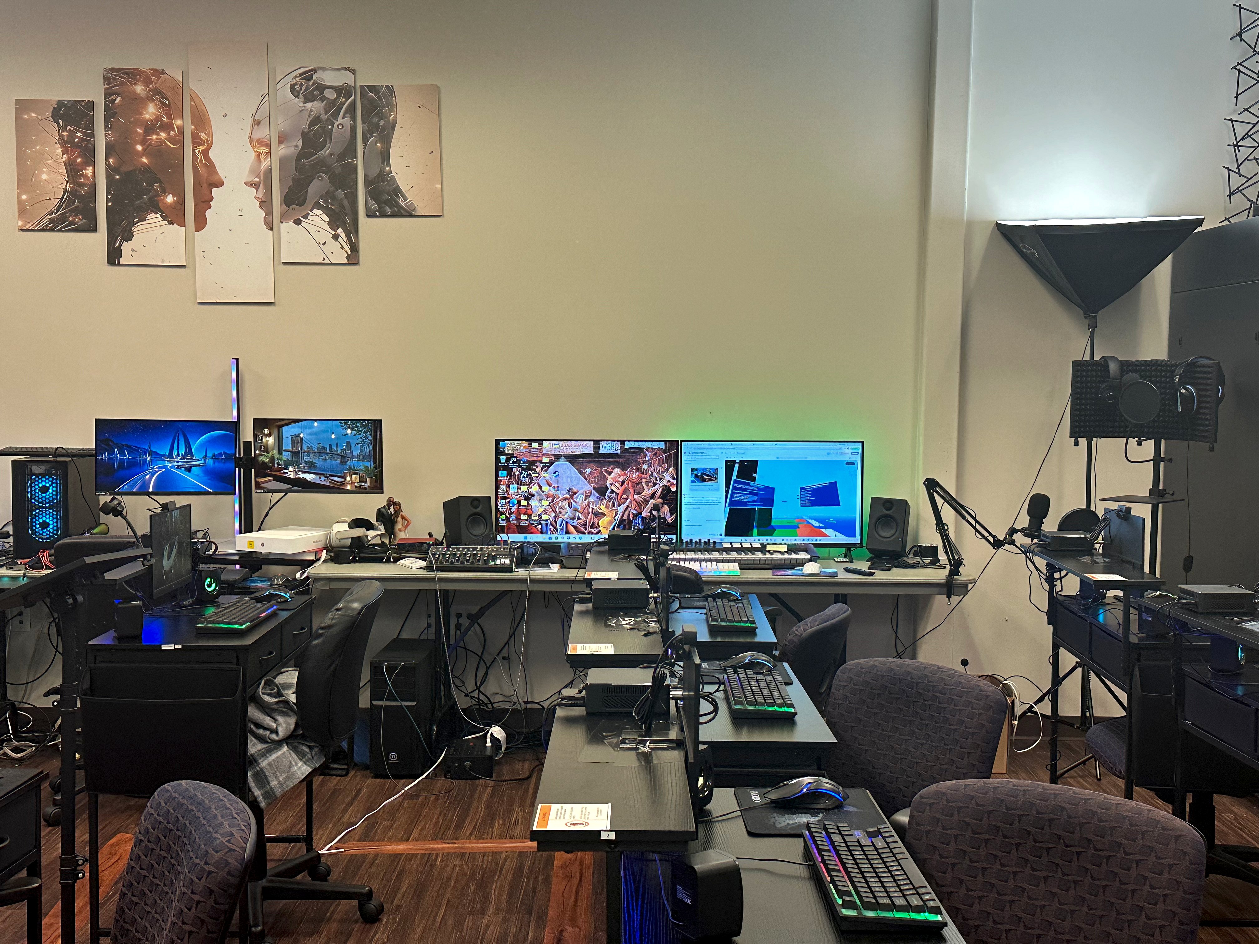 Streaming studio with multiple monitors and equipment