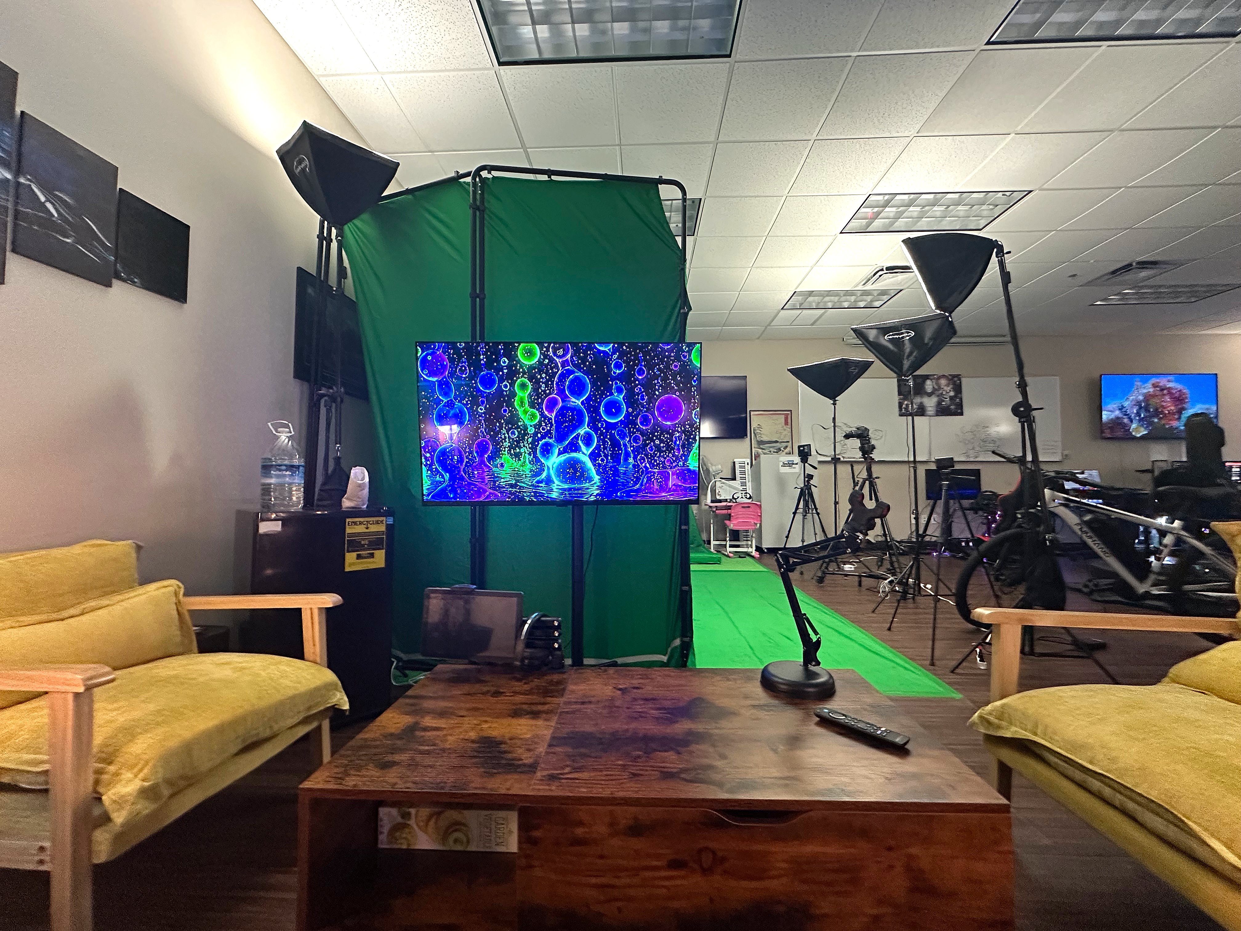 Professional streaming studio with green screen and lighting setup